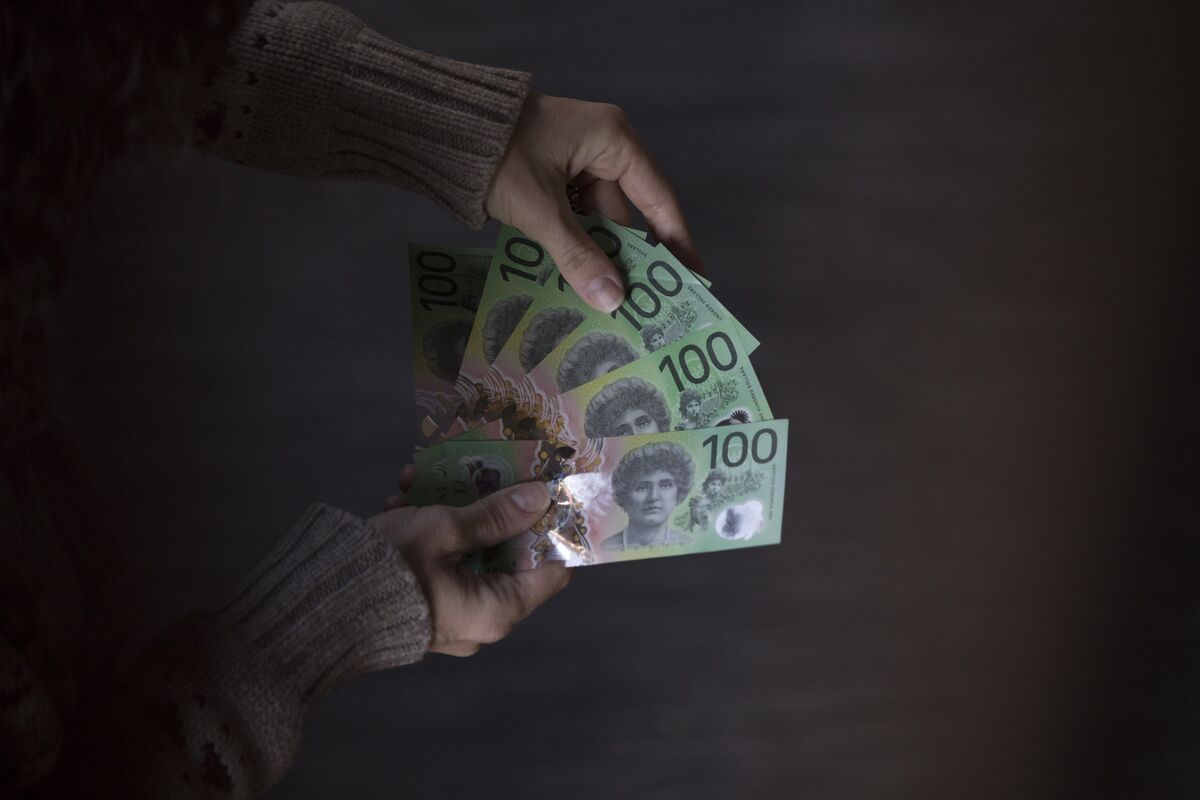 استراتژیست ها می گویند اسلاید استرالیا در مقابل کیوی در شکاف نرخ کاهش می یابد
