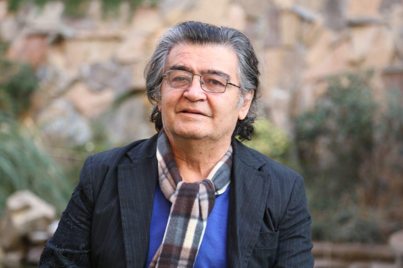 تصویری زیر خاکی از رضا رویگری در ایام نوجوانی در کنار پدرش در تجریش